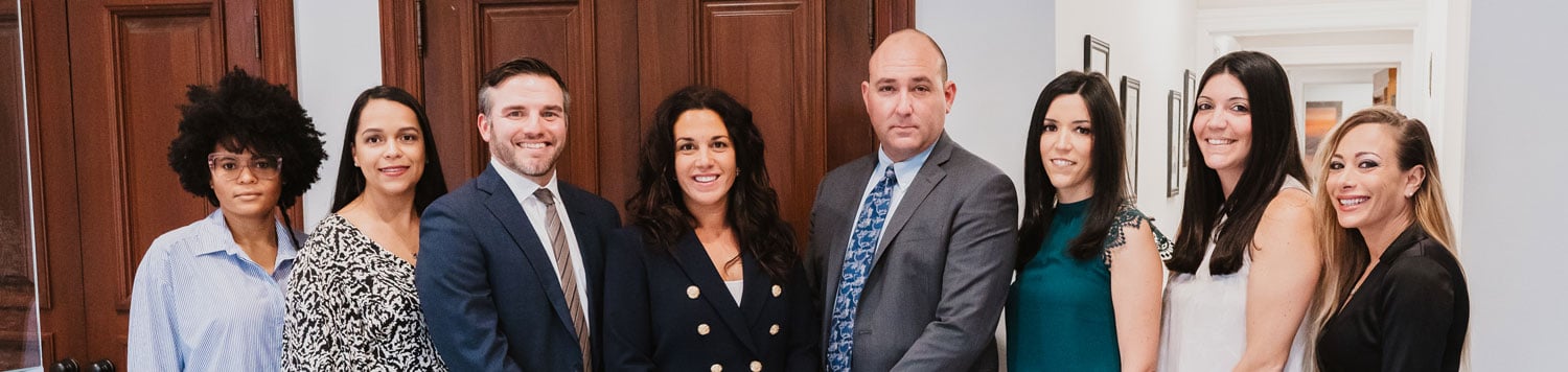 Attorneys and staff at Toresco & Simonelli Attorneys At Law